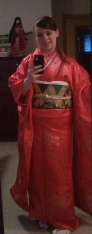 Thank you for emailing the photo of your lovely Christmas furisode my dear ... er, cousin.