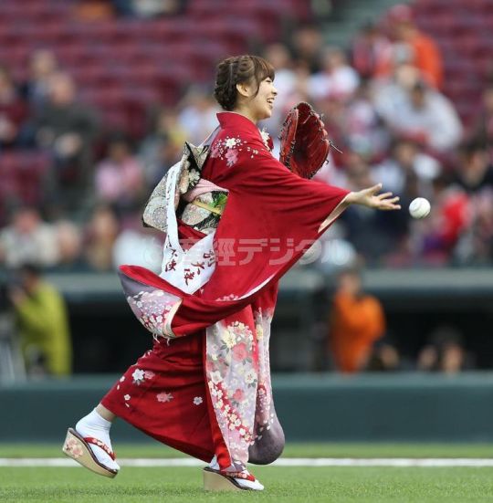 wasamin throws out first pitch